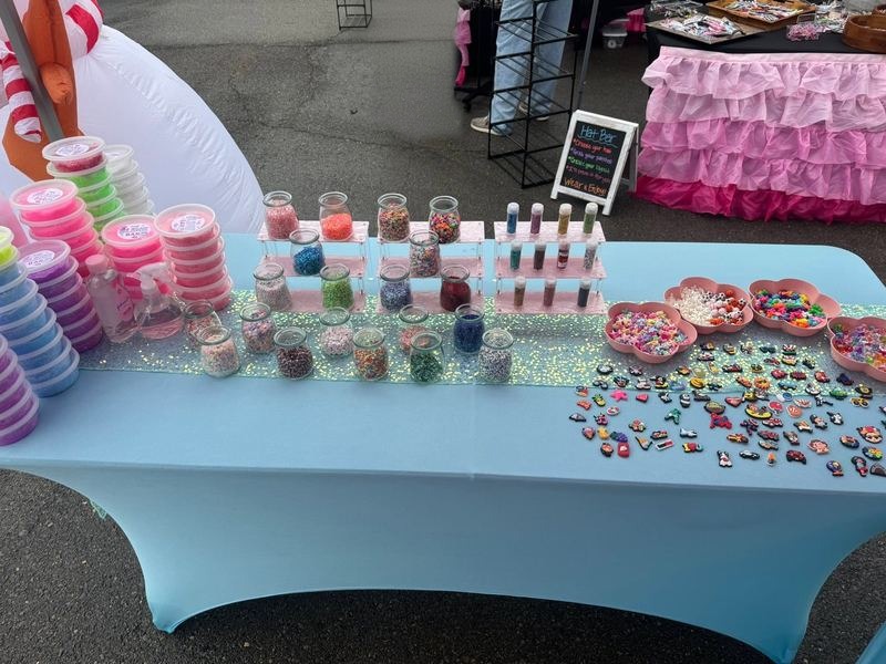The Slime Bar booth with sprinkles, glitter and charms